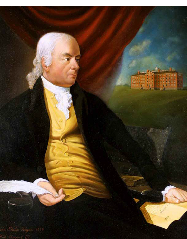 Portait of white-haired man wearing a yellow vest with a red brick building in the background.